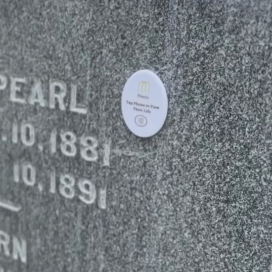 Pontis Memory Stone in action - tapping phone to show memories of the loved one that passed away