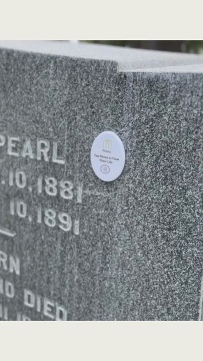 Pontis Memory Stone in action - tapping phone to show memories of the loved one that passed away