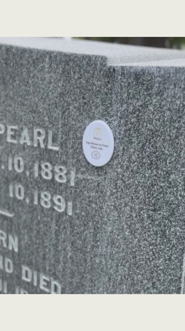Pontis Memory Stone in action - tapping phone to show memories of the loved one that passed away